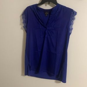 blue v neck shirt